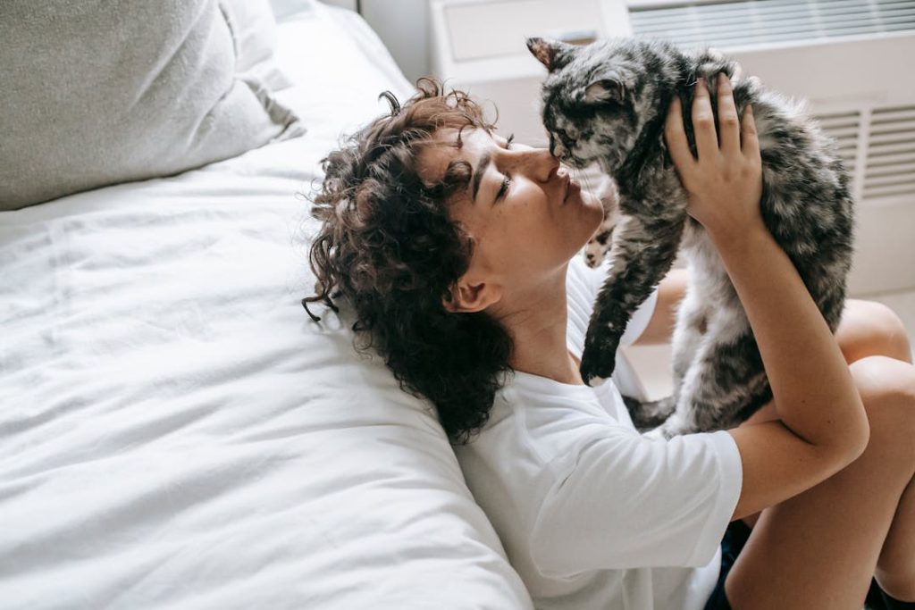 woman with a cat in an apartment