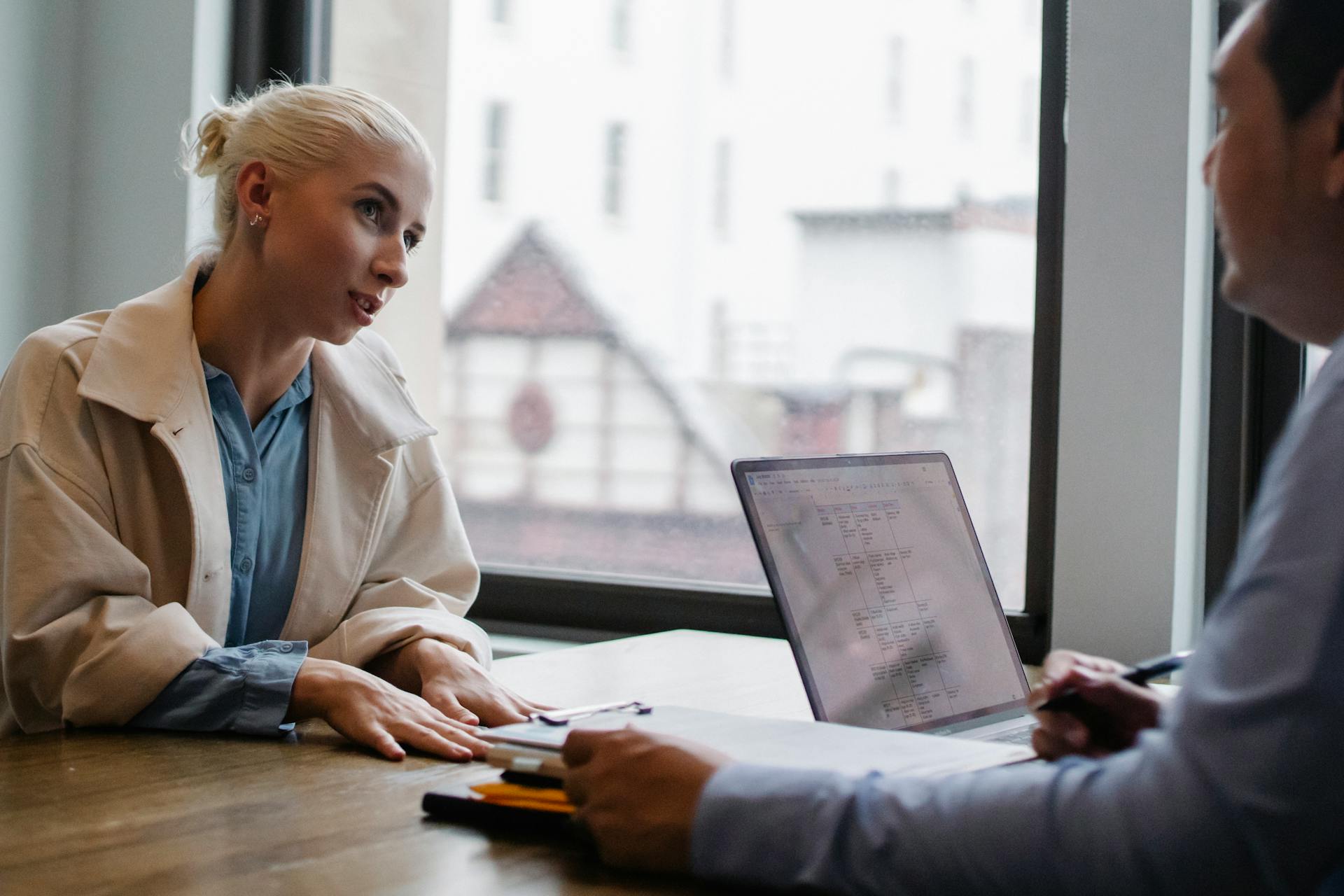 apartment consultant speaking to a woman