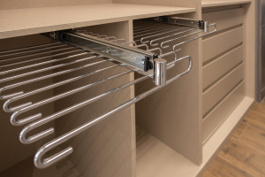 elegant closet with hangers and dividers_w.i.c room